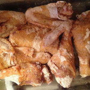 Chicken after being cooked in the oven.